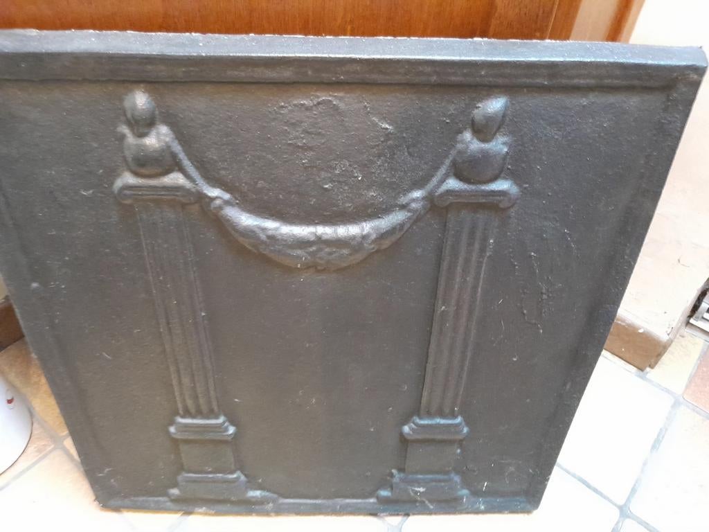 Plaque de cheminee en fonte, Enlèvement