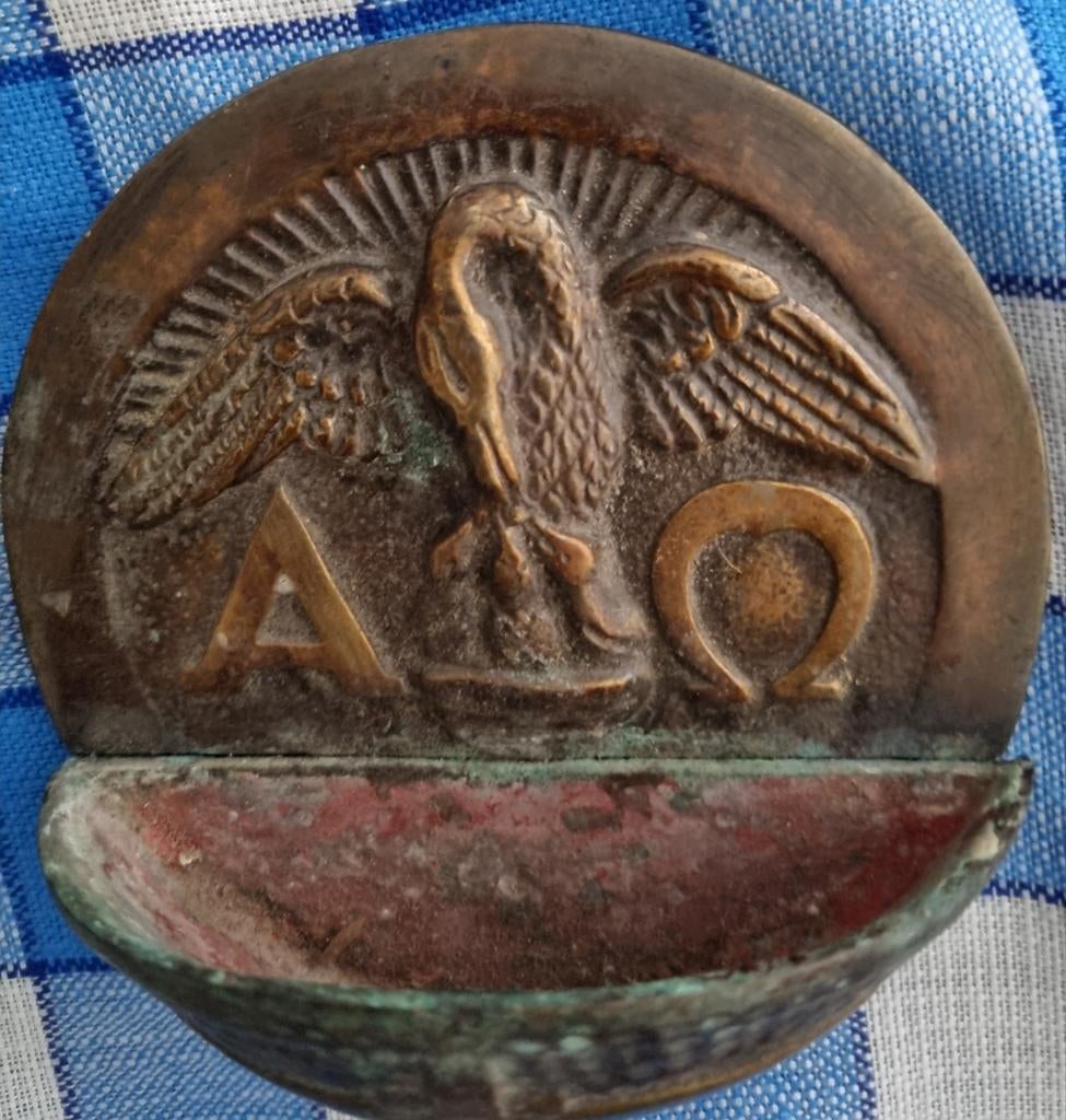 Antieke bronzen wijwatervat, Ophalen