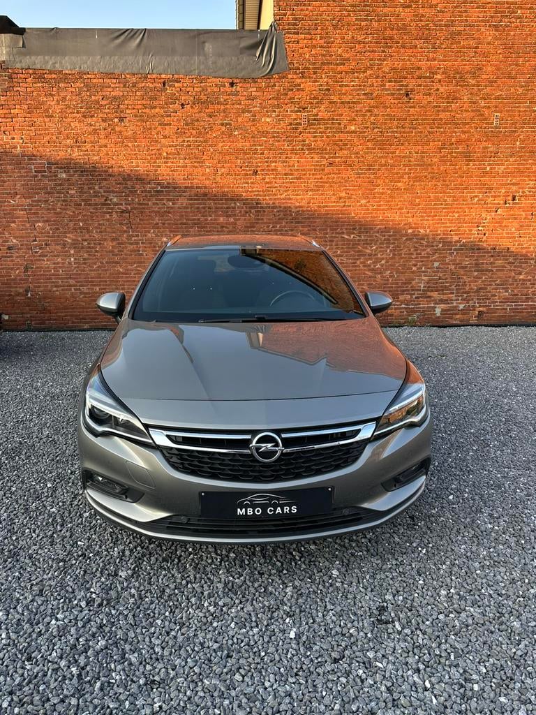 Opel Astra Sports Tourer + 1.4 Turbo| CAM, CRUISE, DODE HOEK, Auto's, Opel, Voorwielaandrijving, Stof, https://public.car-pass.be/vhr/706b0d25-cb9a-4dca-b3bf-1f9ad259e24c