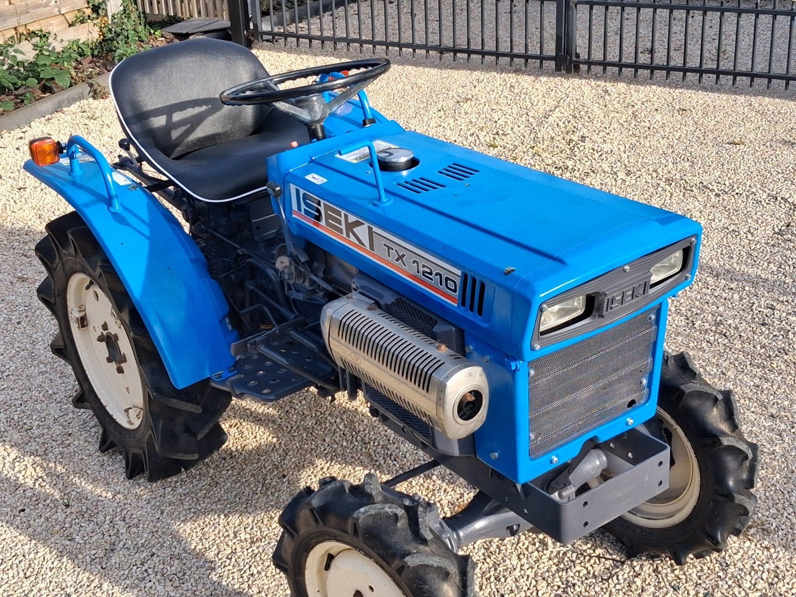 TE KOOP – ISEKI TX1210 4x4 COMPACTTRACTOR, Ophalen