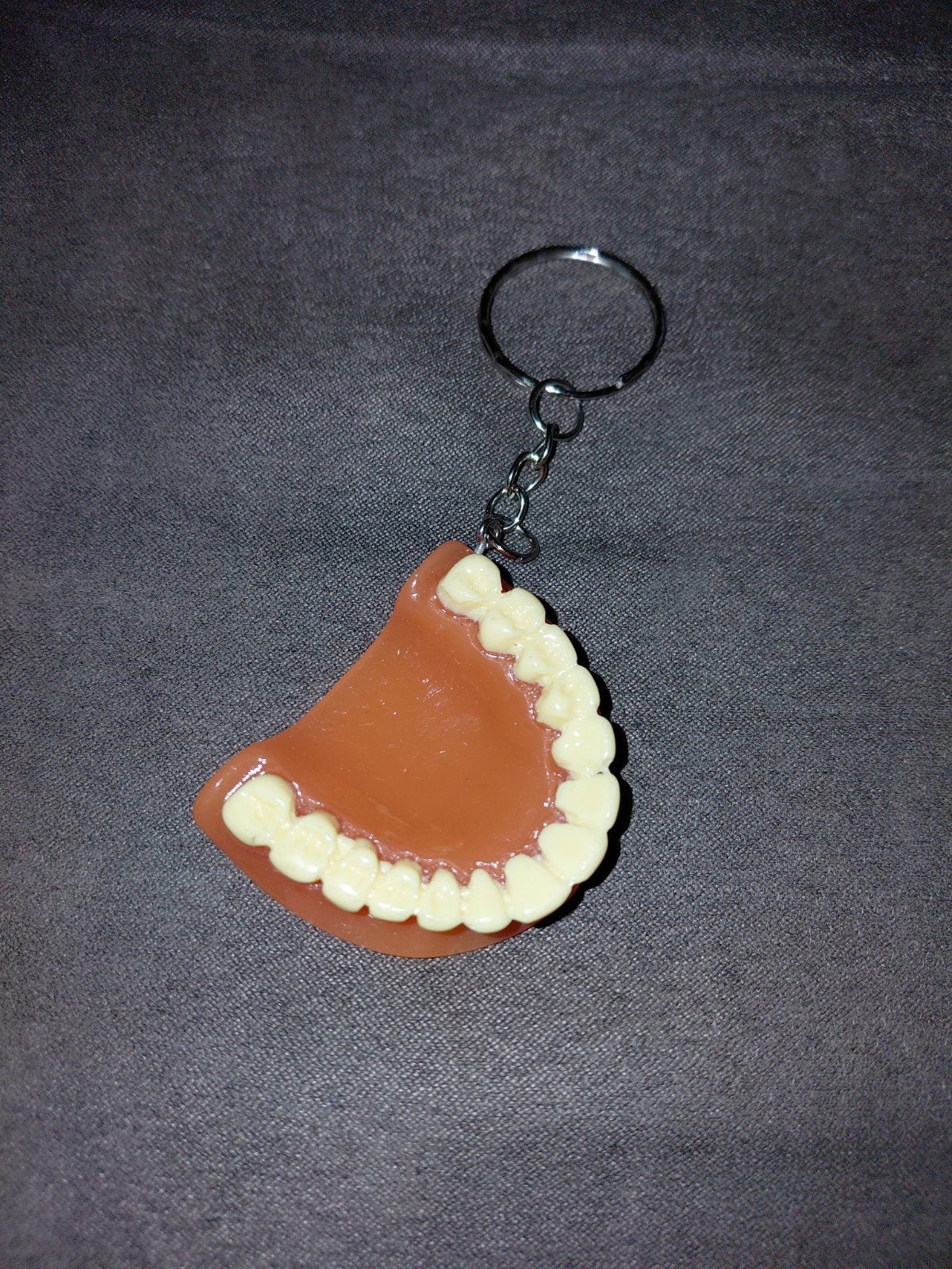Porte-clés dentier, Enlèvement