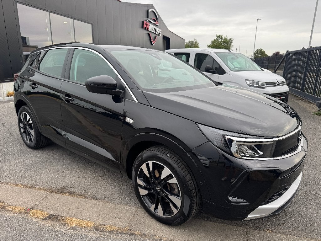 Opel Grandland 1.2 benzine camera carplay cruise pdc, Dealer onderhouden, Stof, 1199 cc, https://public.car-pass.be/vhr/55383e99-7bbb-4915-9fda-f91ce5255e9c
