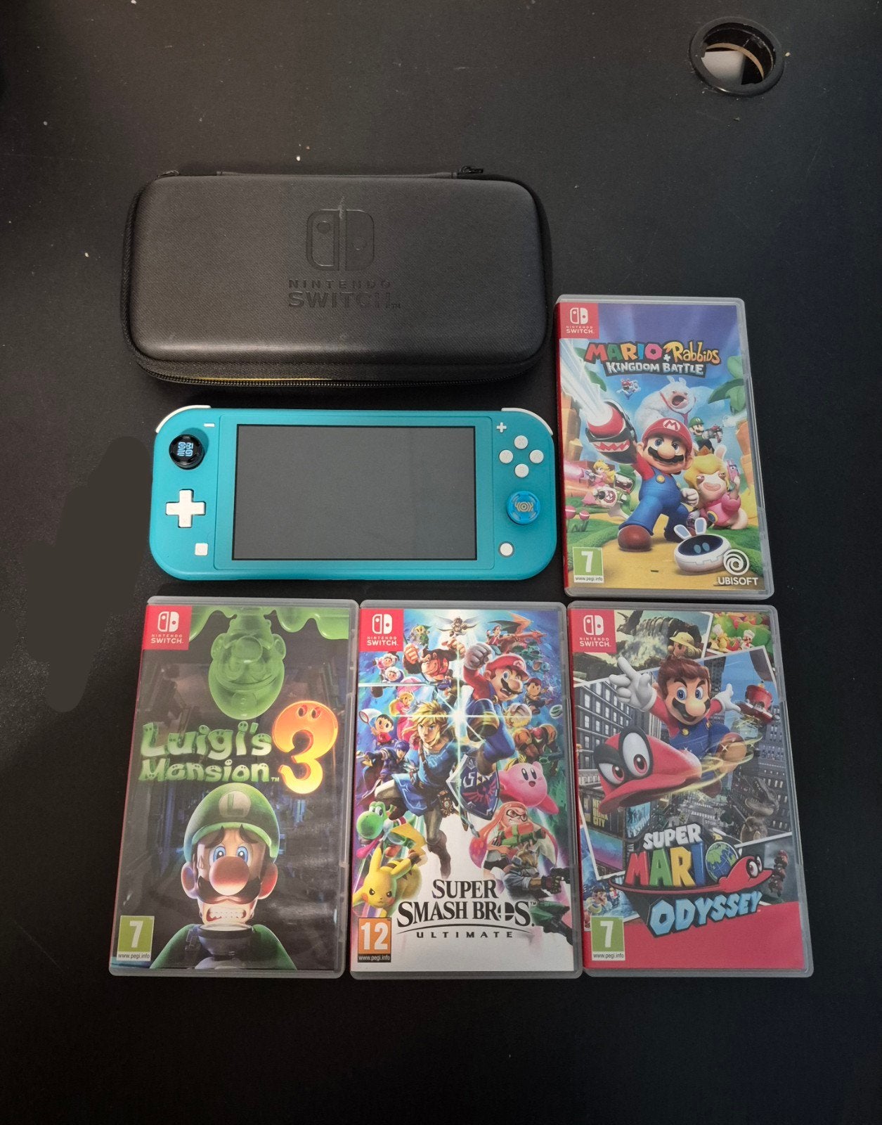 Nintendo Switch Lite Bleu Turquoise + 4 Jeux, Games en Spelcomputers, Ophalen of Verzenden, Turquoise, Zo goed als nieuw, Met beschermhoes of tas