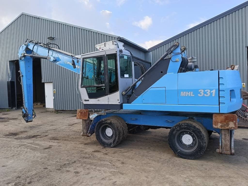 Fuchs MHL 331 overslagkraan umslagbagger waste handler, Articles professionnels, Machines & Construction | Grues & Excavatrices