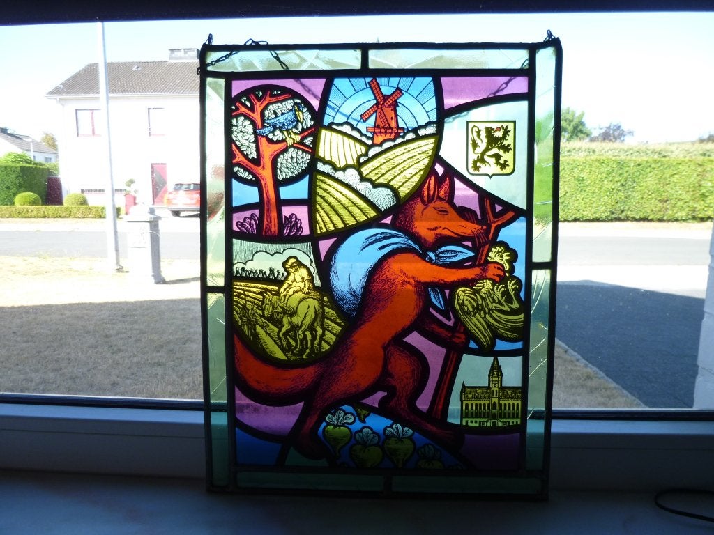 Glasraam met lood van de stad Sint-Niklaas., Ophalen