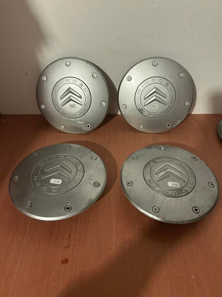 4 originele Citroën berlingo wieldoppen, Ophalen of Verzenden, Gebruikt