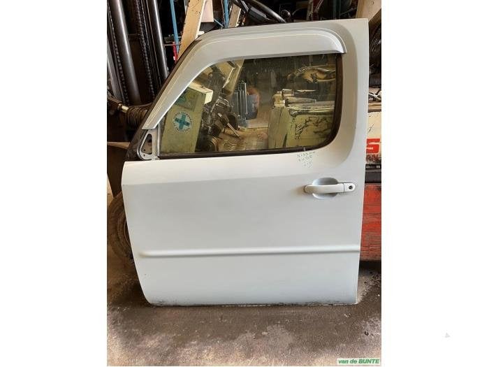 Portier 4Deurs links-voor van een Nissan Cube (ONB), Gebruikt, -, Deur, -