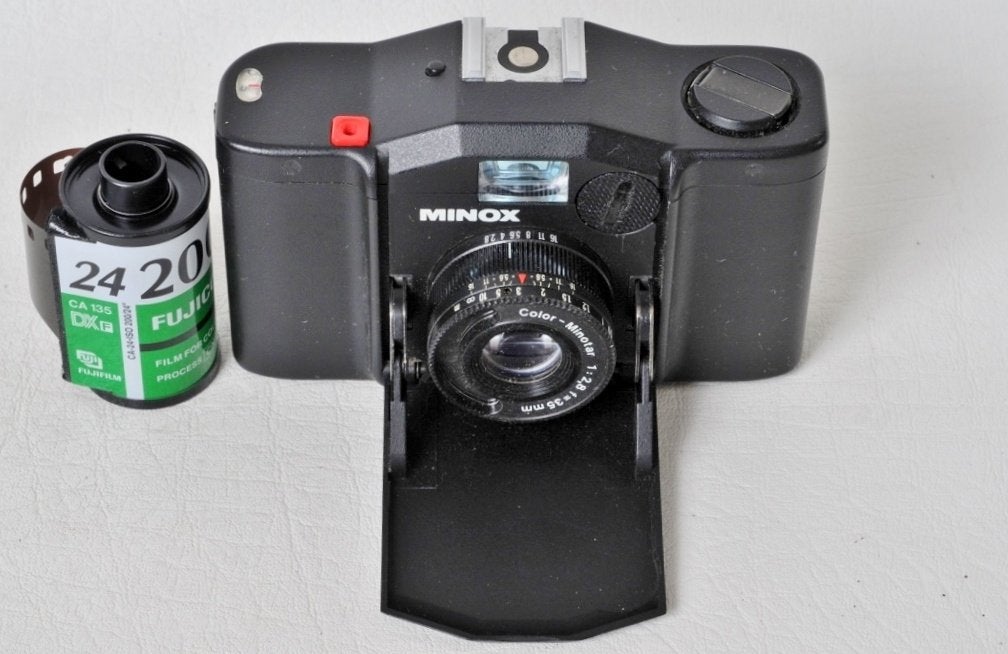 Minox GL + leren tas + gebruikershandleiding enz..., Audio, Tv en Foto, Ophalen of Verzenden, Zo goed als nieuw, Compact