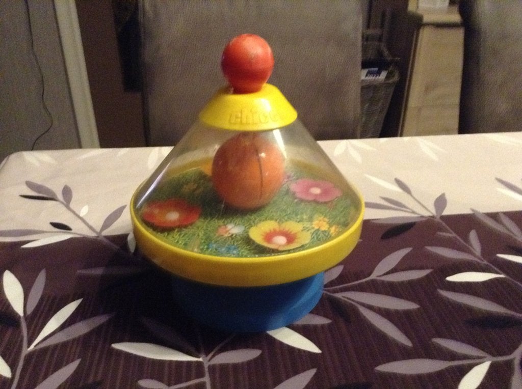 Plastic vintage speelgoed tol, Kinderen en Baby's, Ophalen of Verzenden, Gebruikt, Duw- of Trekspeelgoed