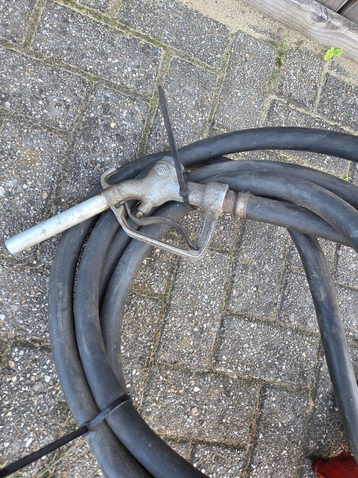 vloeistofpomp met pistool, Ophalen
