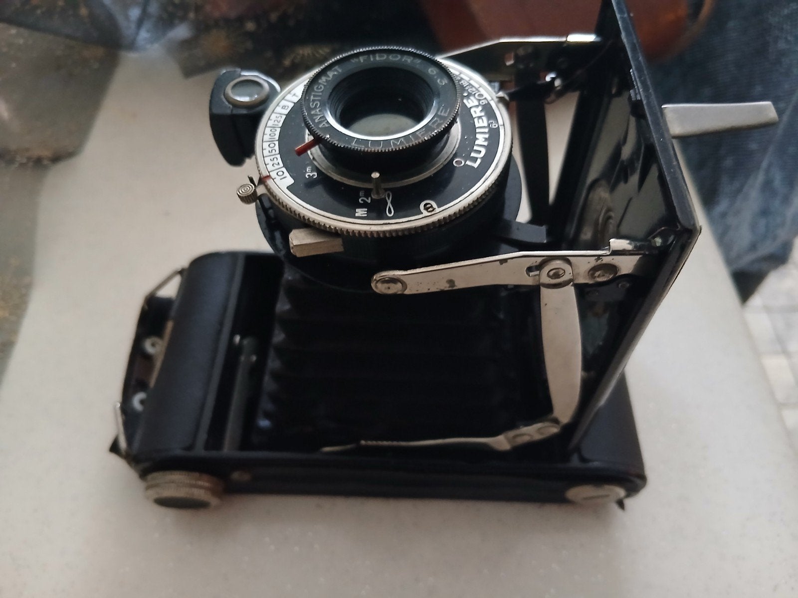 Appareil photo vintage pliant, Enlèvement