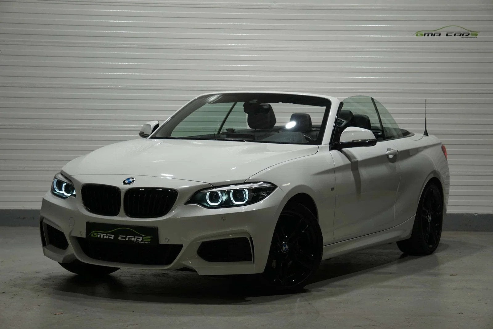 BMW 2 Serie 218 Cabriolet 218iA-Mpack-Aut-Navi-Cam-CruiseC-C, Auto's, 4 zetels, Gebruikt, 136 pk, Wit