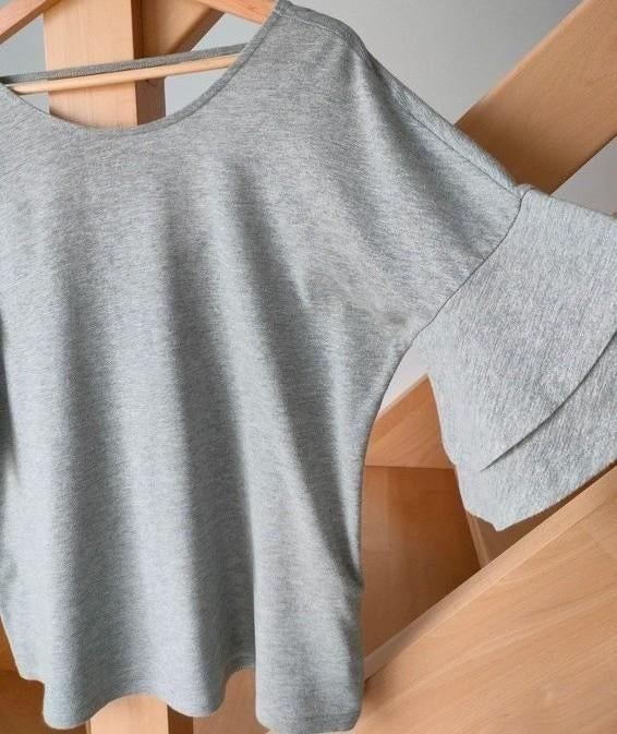 Prachtige glitter T-shirt met open rug. Zeer speciale mouwen, Kleding | Dames, Maat 38/40 (M), Only, Ophalen of Verzenden, Zo goed als nieuw