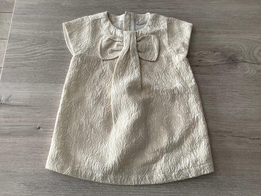Baby meisje's gouden kleedje met strik (Maat 74), Kinderen en Baby's, Cuddles & smile, Meisje, Ophalen of Verzenden, Zo goed als nieuw