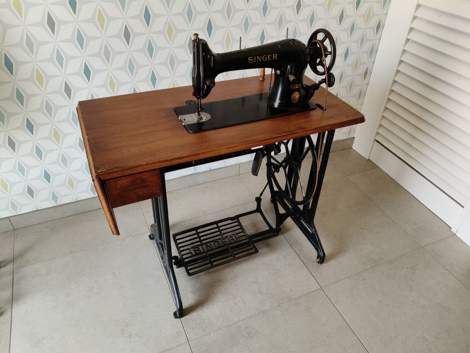 Singer naaimachine - werkende staat, Ophalen