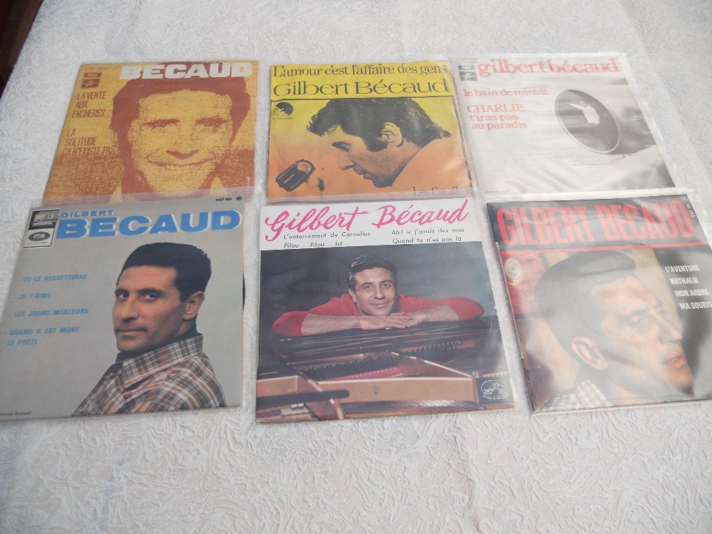 12 singles 7"  van Gilbert Becaud, Enlèvement ou Envoi, Pop, Utilisé, EP