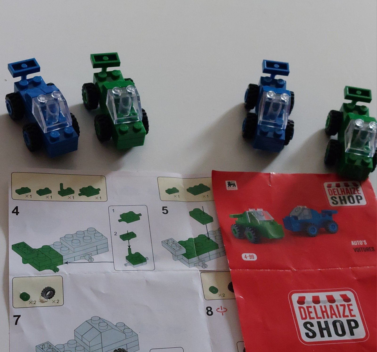 2 lots de 2 voitures Pixtoys. Aktie Delhaize. 3 €/set., Enlèvement, Comme neuf