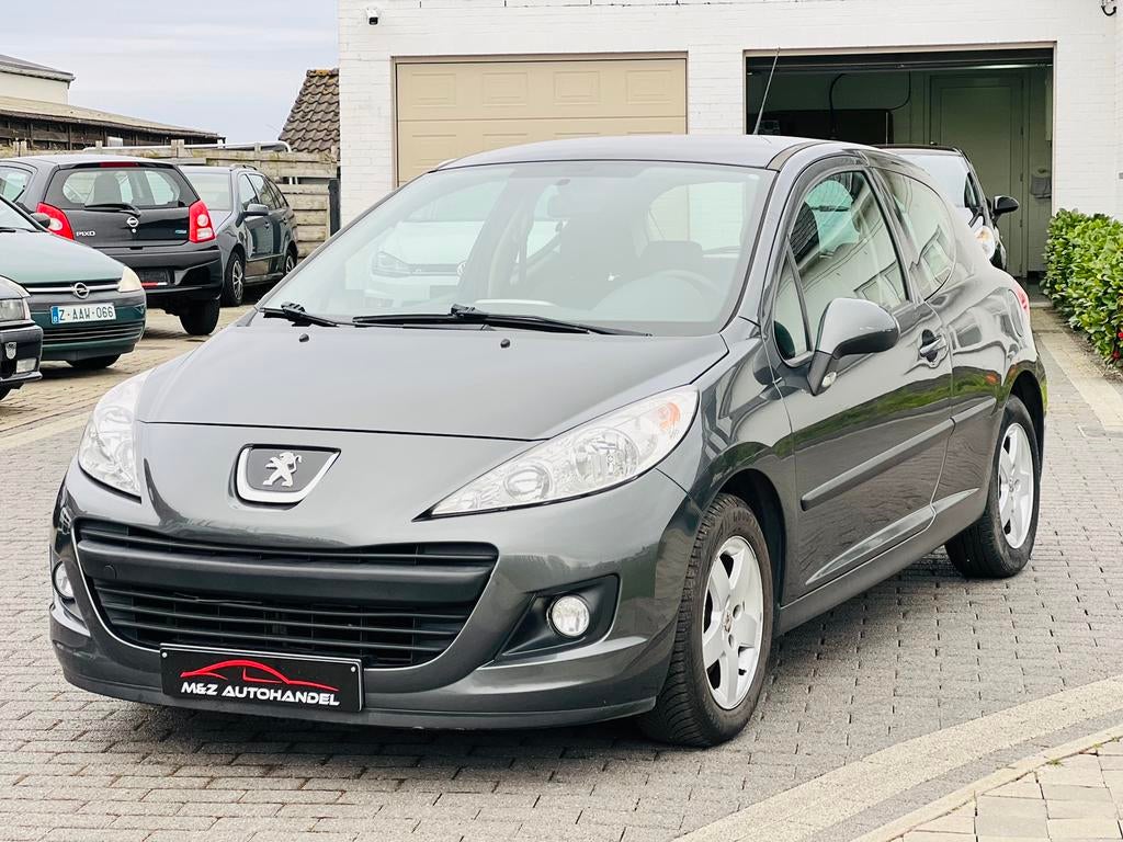 Peugeot 207 1.4i Benzine * 128.000 Km * 2011 * Pano dak, Autos, Euro 5, Achat, Entreprise, Capteur de lumière