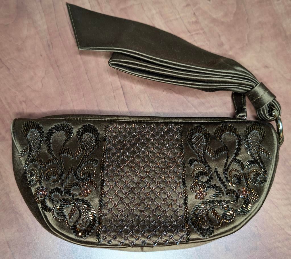 Een Sergio Rossi-clutch, Handtassen en Accessoires, Tassen | Damestassen, Ophalen of Verzenden, Nieuw