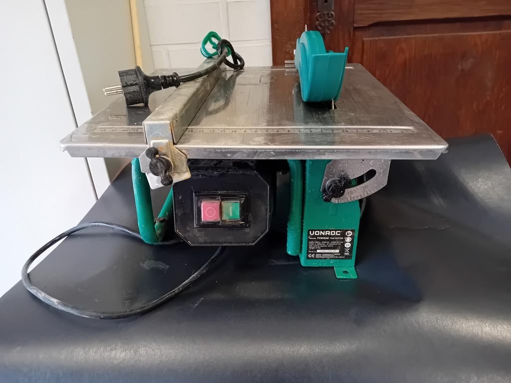 Tegelzaagmachine Vonroc, Ophalen