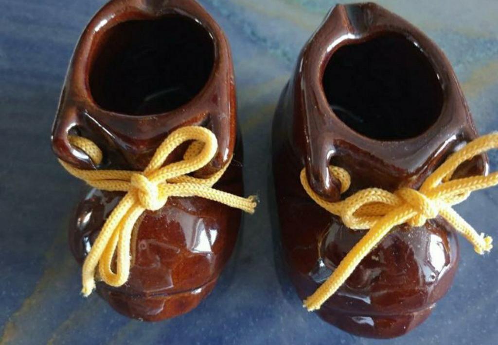 Babyschoentjes keramiek, Ophalen