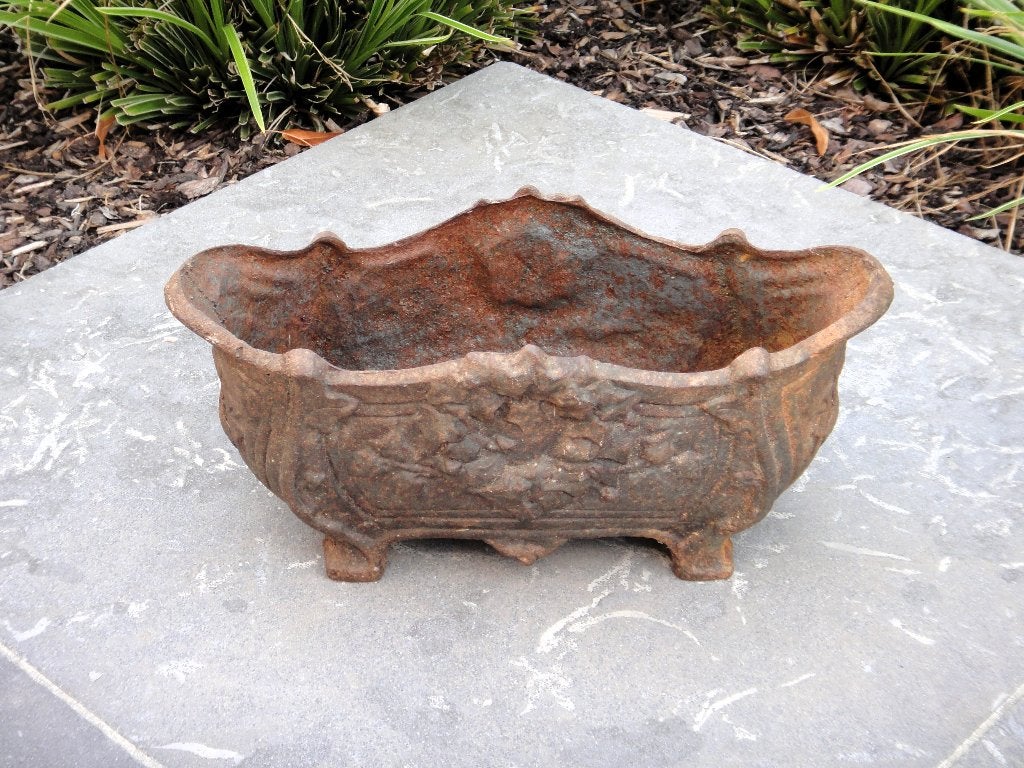 Gietijzeren jardinière!, Enlèvement