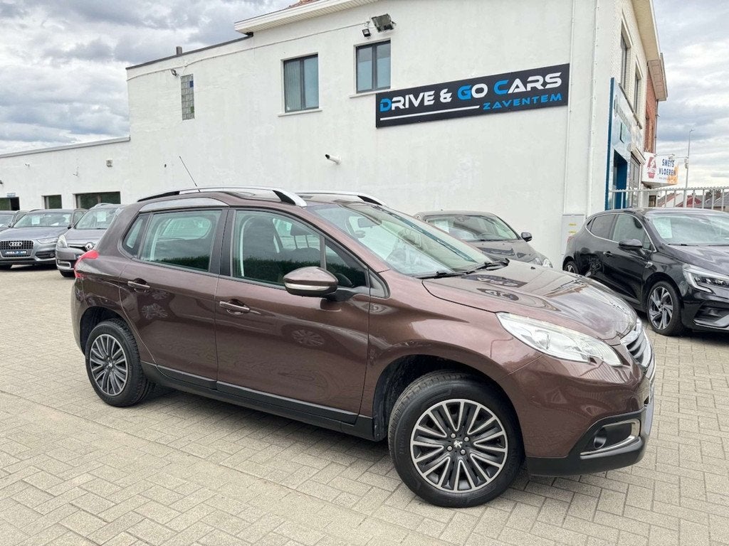Peugeot 2008 Allure 1.2i Benzine - Airco * 1 JAAR GARANTIE *, Voorwielaandrijving, Stof, Gebruikt, 1199 cc