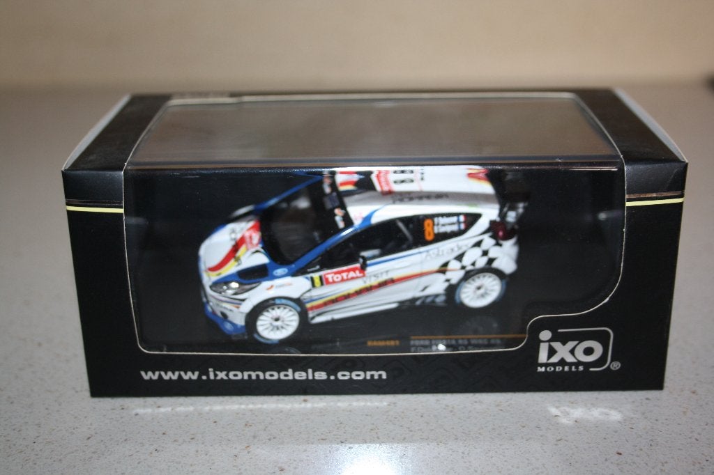 1:43 IXO Ford Fiesta RS WRC F.Delecour/D.Savignoni rally, Enlèvement ou Envoi, Comme neuf, Voiture