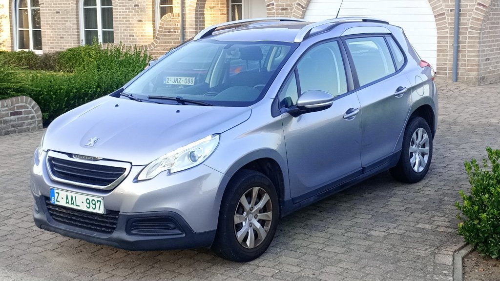 Peugeot 2008 benzine in prima staat., Voorwielaandrijving, Euro 5, Stof, Zwart