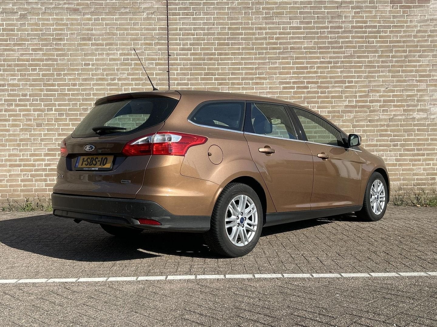 Ford Focus Wagon 1.0 EcoBoost Titanium | Climate | Cruise |, Auto's, Focus, Bedrijf, 117 g/km, Bruin