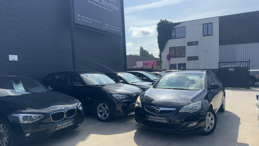 Opel Astra 1.6Benzine Automaat 153.xxxkm 2010 Garantie, Auto's, Stof, Electronic Stability Program (ESP), Zwart, Zwart