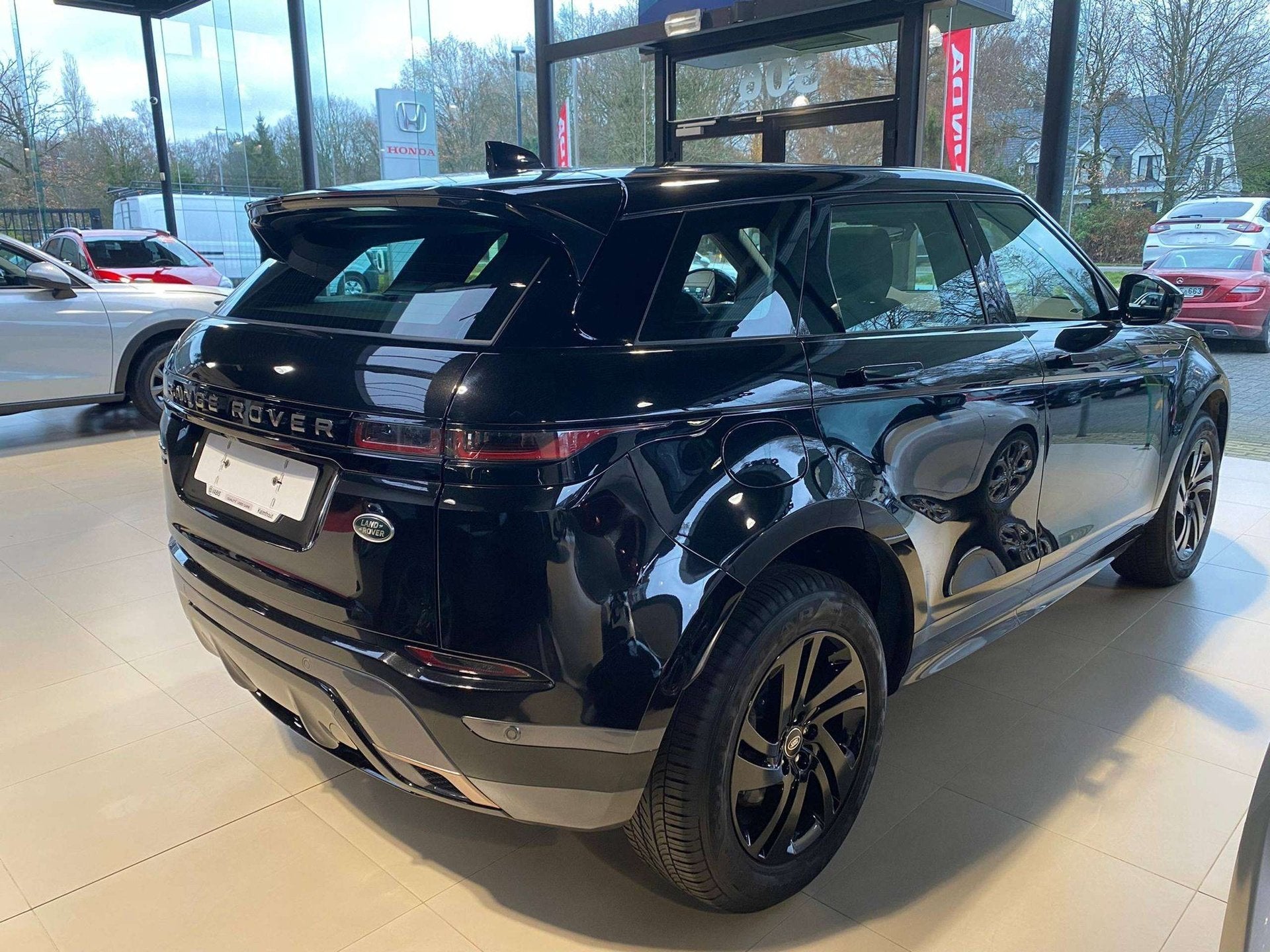 Land Rover Range Rover Evoque Evoque 1.5 PHEV 4WD P300E R-Dy, Auto's, Gebruikt, 4 cilinders, Zwart, Plug-in hybride