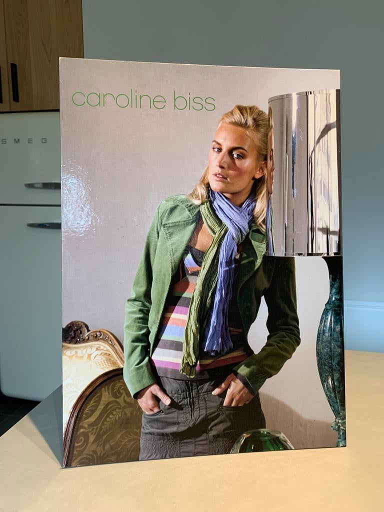 Vintage reclamebord Caroline Biss - winkeldisplay, Ophalen of Verzenden, Reclamebord