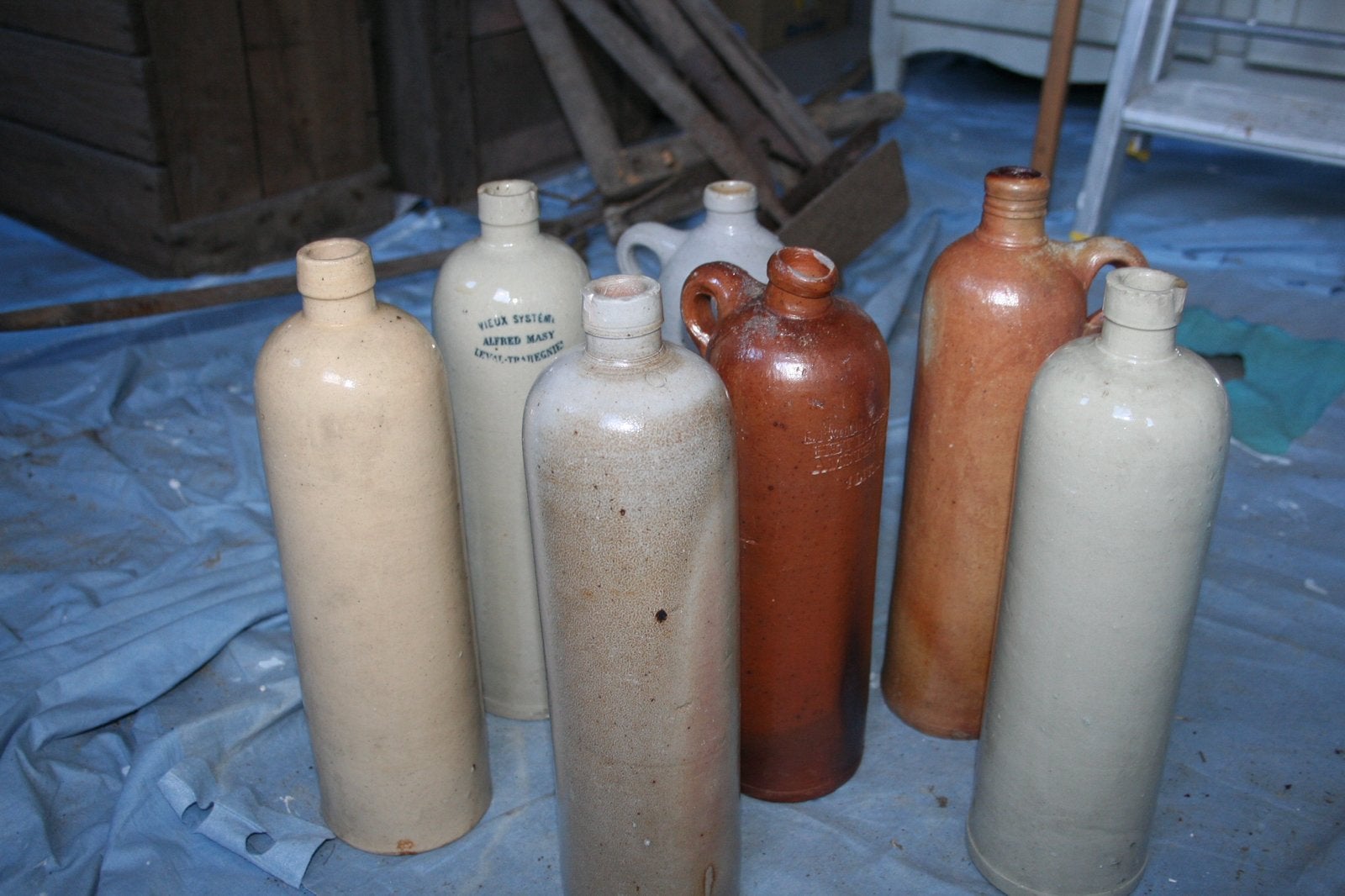 Lot de 7 bouteilles en grès, Antiquités & Art, Enlèvement