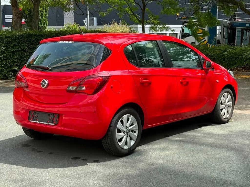 Opel Corsa 1.4 2016 | Automatique · Écran, Autos, Rouge, Achat, Euro 6, Entreprise