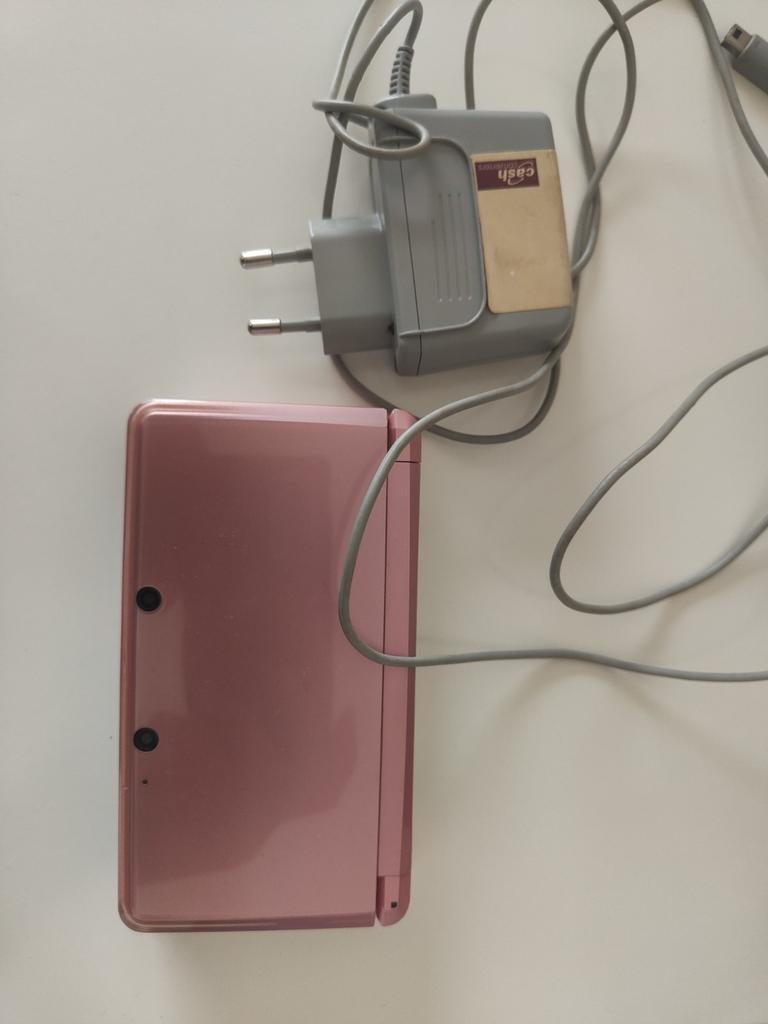 Functionele roze Nintendo 3ds-console + 2 games, Ophalen of Verzenden, Roze, 3DS