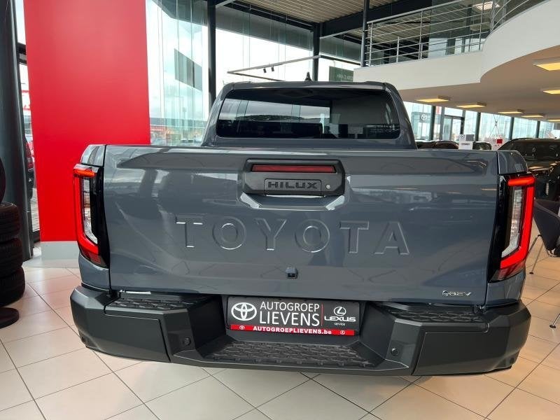 Toyota Hilux Double Cab Style EV 59,2 kWh, Auto's, Automaat, 145 kW, Zwart, Adaptive Cruise Control