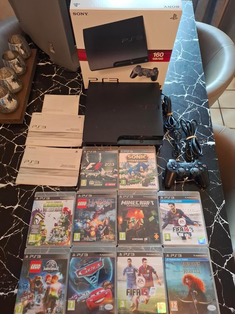 Sony PlayStation 3-console in doos + 10 games!, Avontuur en Actie, 2 spelers, Ophalen of Verzenden, Zo goed als nieuw