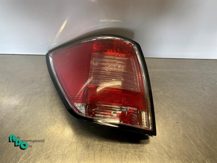 Feu arrière gauche d'un Opel Astra (Astra H 04-), -, Opel, 3 mois de garantie, Utilisé