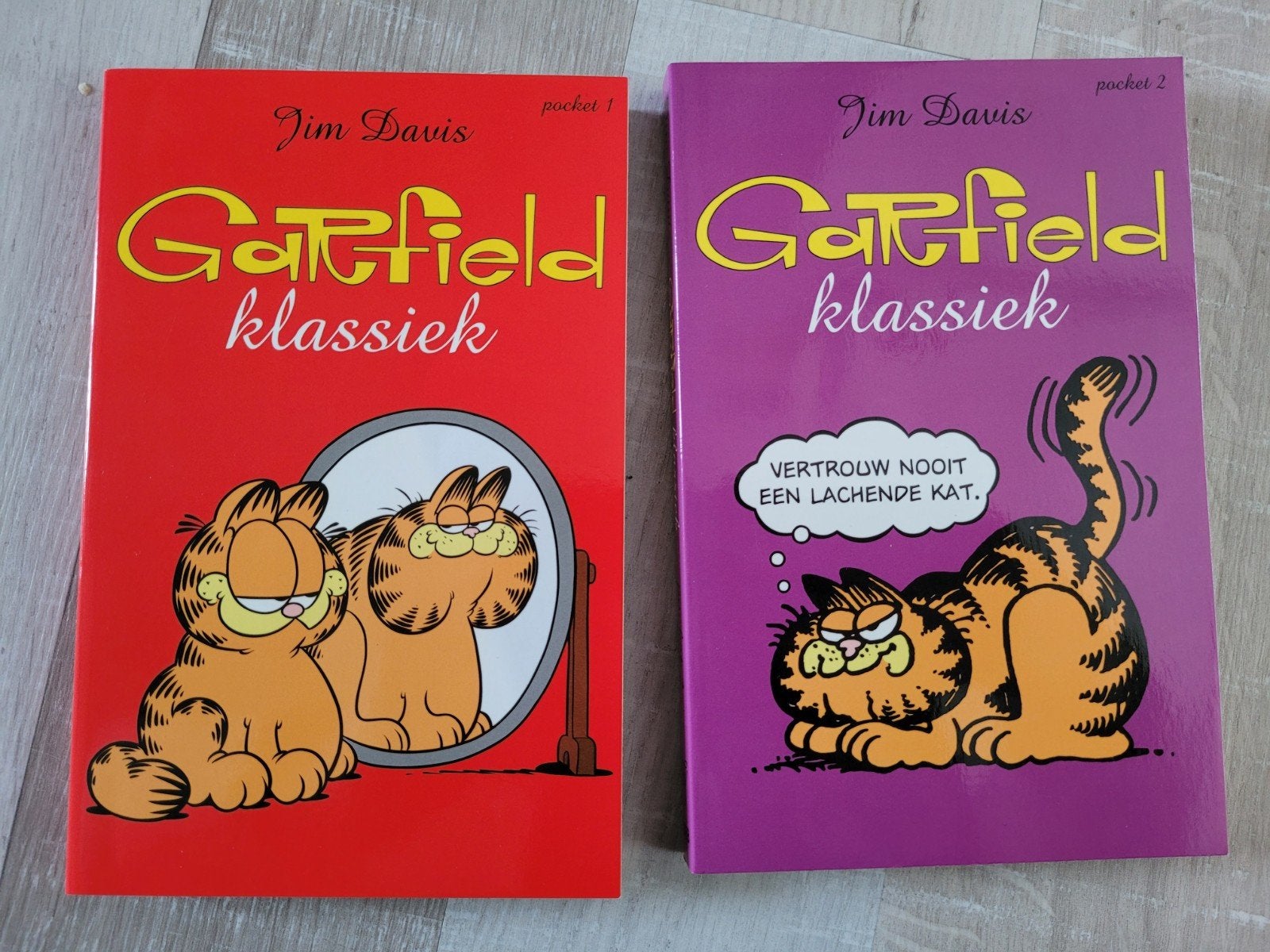 Jim Davis - Garfield klassiek - pocket 1&2, Boeken, Stripverhalen, Jim Davis, Ophalen of Verzenden, Zo goed als nieuw, Meerdere stripboeken