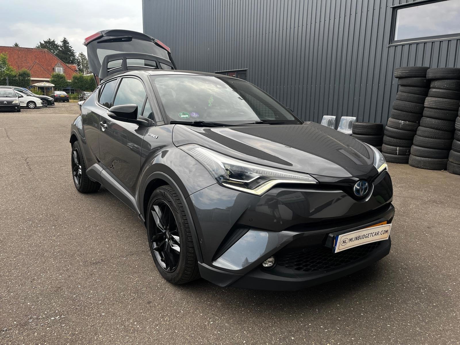 Toyota C-HR 1.8 Hybrid Bi-Tone, Auto's, Toyota, Dealer onderhouden, Euro 6, 4 cilinders, 72 kW
