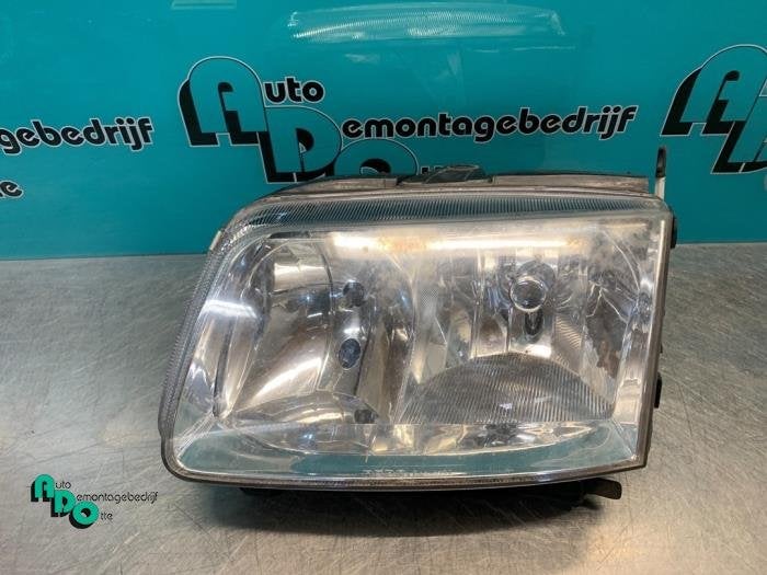 Phare gauche d'un Volkswagen Polo (Polo 99-), Volkswagen, -, 3 mois de garantie, Utilisé
