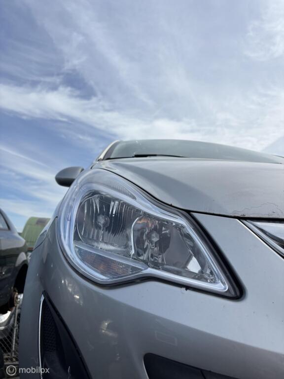 Koplamp rechts Opel Corsa D ('06-'15), Gebruikt, Opel, Ophalen of Verzenden, Opel
