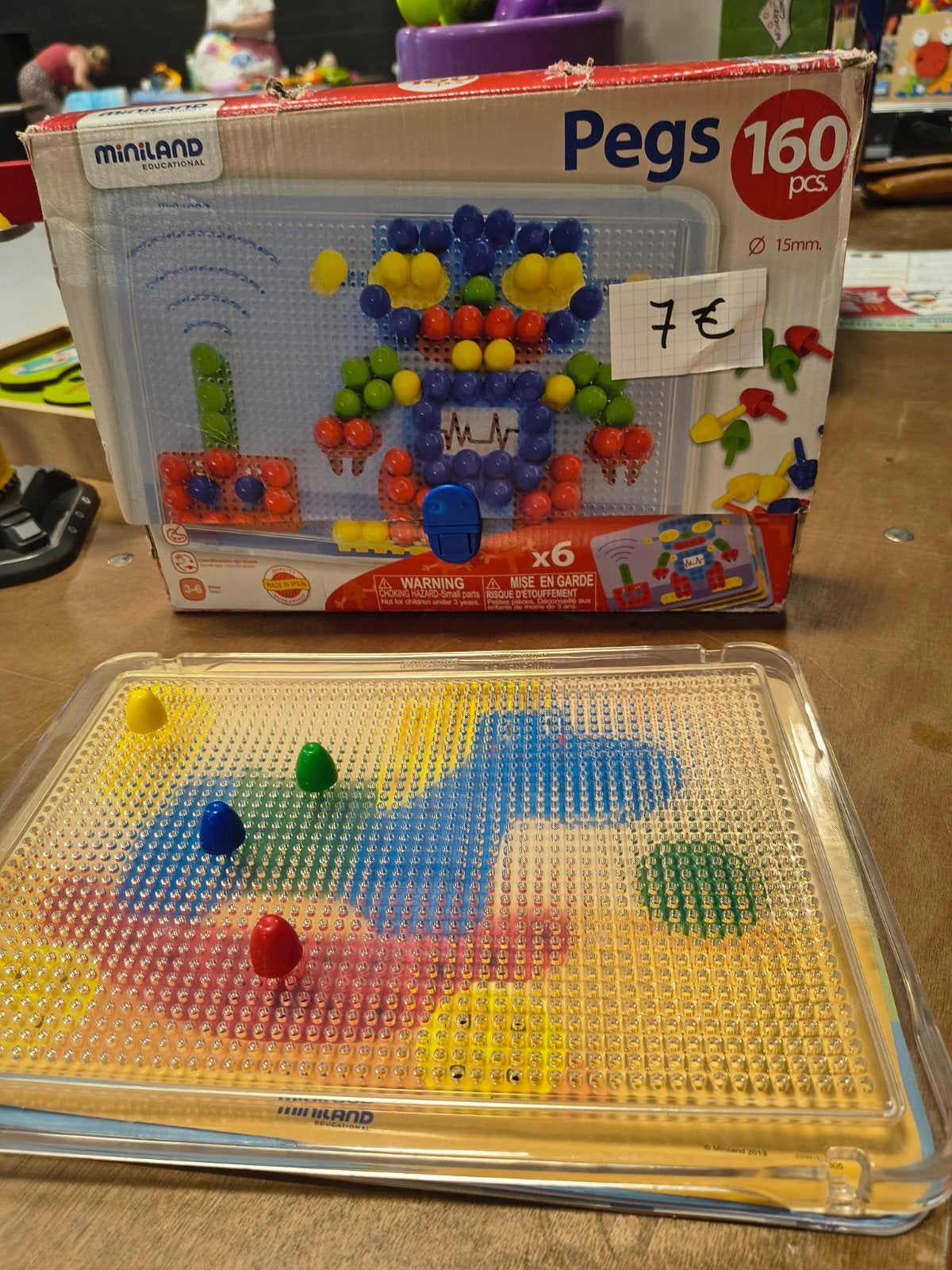 Pinnetjes bord met tekeningen om te maken, Ophalen