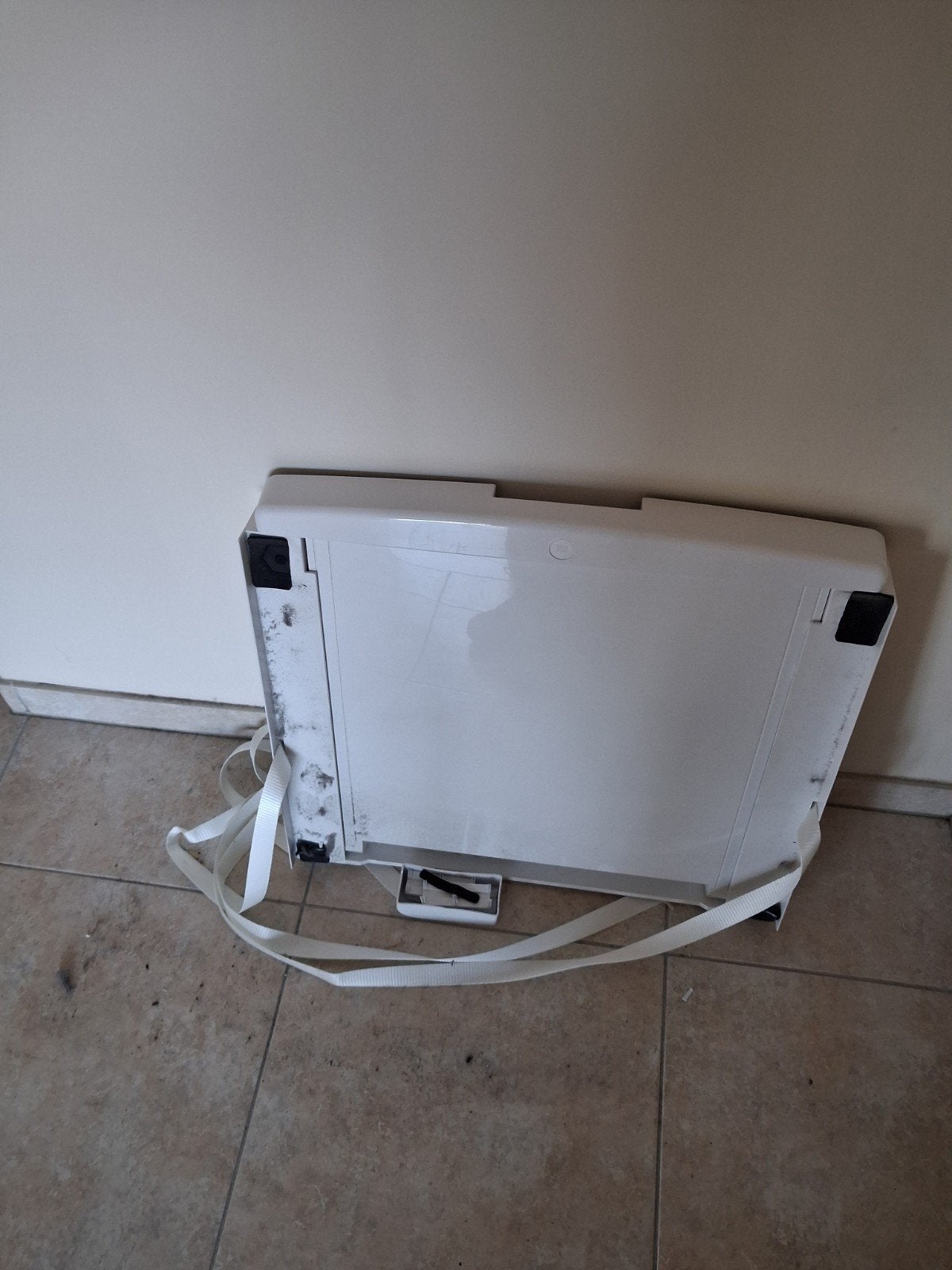 universeel tussenstuk wasmachine en droger, Ophalen