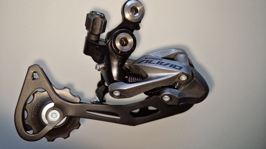 Derailleur Shimano Alivio achteraan 9 speed NIEUW, Fietsen en Brommers, Fietsonderdelen, Racefiets, Nieuw, Ophalen of Verzenden