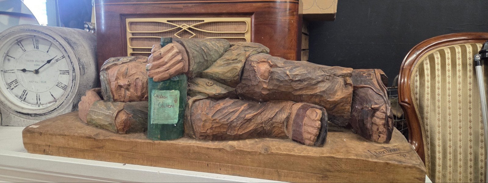 Beeld houtsnijwerk, Ophalen