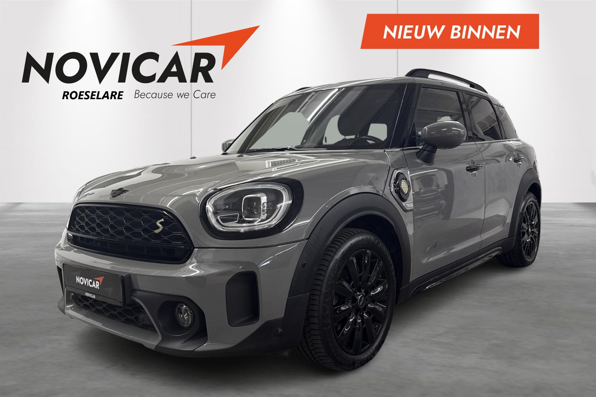 Mini Countryman Cooper S E ALL4 AT, Auto's, Automaat, Stof, Gebruikt, Zwart