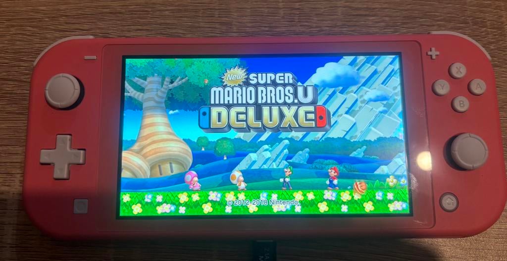 Nintendo switch lite, Ophalen, Zo goed als nieuw