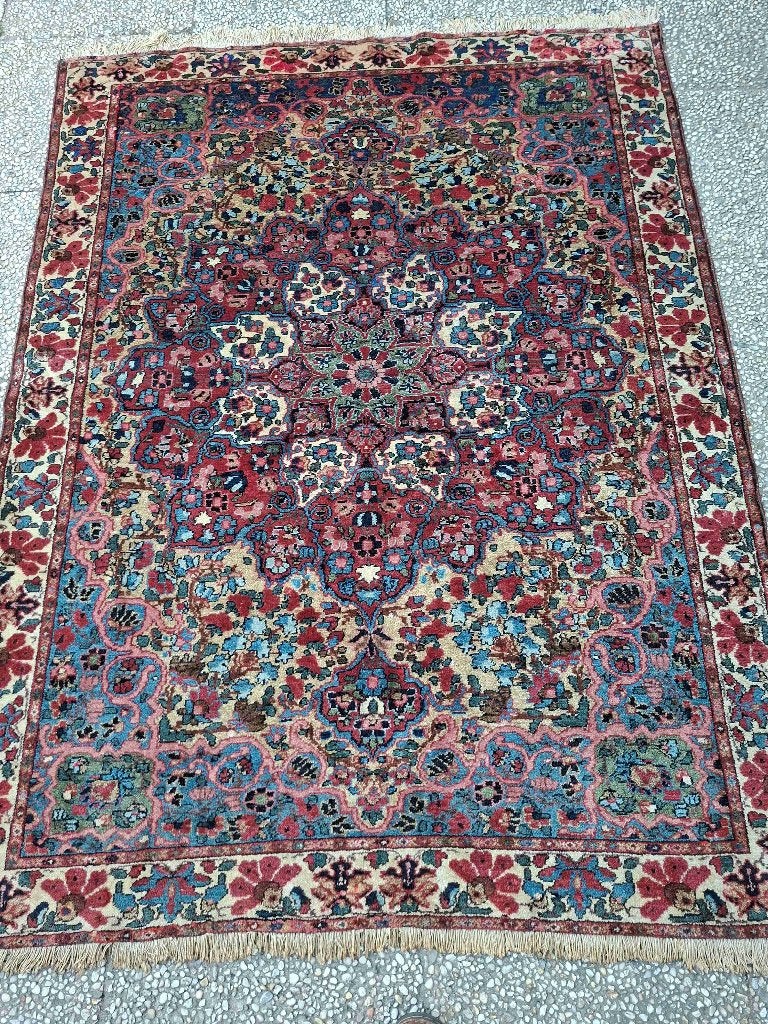Oud perzisch tapijt, Ophalen